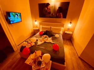 A television and/or entertainment centre at Artisti Bed&Dreams
