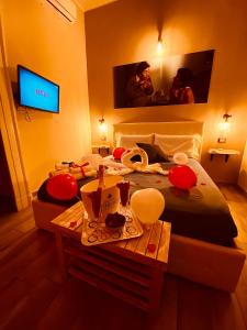 A television and/or entertainment centre at Artisti Bed&Dreams