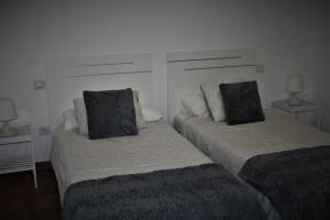 Posteľ alebo postele v izbe v ubytovaní Apartamento los Rostros