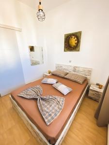 Ein Bett oder Betten in einem Zimmer der Unterkunft Golden View House