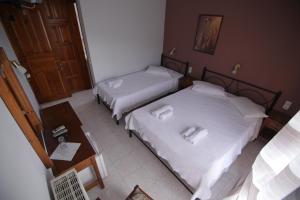 Letto o letti in una camera di Mirtillo Apartments