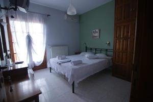 Letto o letti in una camera di Mirtillo Apartments