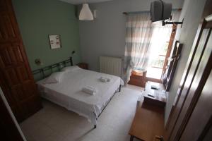 Letto o letti in una camera di Mirtillo Apartments