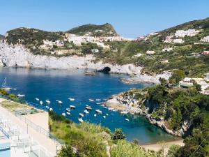 a view of a bay with boats in the water at Ponza Cala Feola IMMOBILEVANTE in Ponza