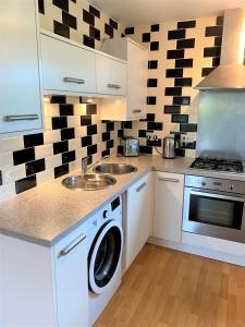 Nhà bếp/bếp nhỏ tại Firpark City Apartment - 2 Bedrooms