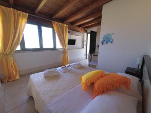Postel nebo postele na pokoji v ubytování Hotel Alba Chiara Sant'Andrea Salento