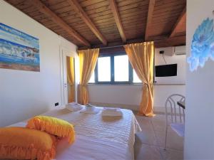 Postel nebo postele na pokoji v ubytování Hotel Alba Chiara Sant'Andrea Salento