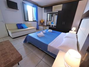 Postel nebo postele na pokoji v ubytování Hotel Alba Chiara Sant'Andrea Salento