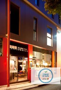 a store front of a building with a sign at Funchal Design Hotel in Funchal