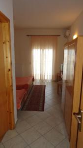 A bed or beds in a room at Hotel Kastro