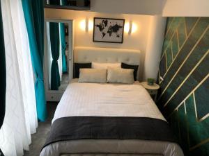 Postel nebo postele na pokoji v ubytování Luxury rooms Lira
