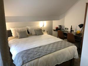 מיטה או מיטות בחדר ב-Luxury rooms Lira