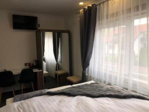 Postel nebo postele na pokoji v ubytování Luxury rooms Lira