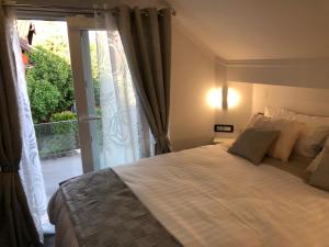 Postel nebo postele na pokoji v ubytování Luxury rooms Lira