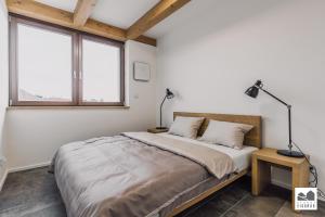 Postel nebo postele na pokoji v ubytování Resort Lednice - Eisgrub