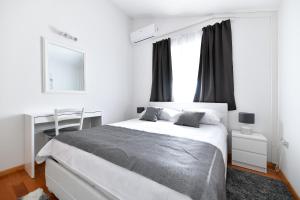 Posteľ alebo postele v izbe v ubytovaní Bellevue Hill apartment + 37 fotografií