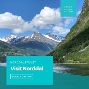 a mountain view of a river and mountains at Norway Holiday Apartments - Norddalstunet in Norddal