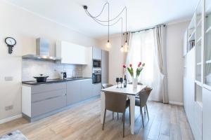 A kitchen or kitchenette at Casapalestro8#1