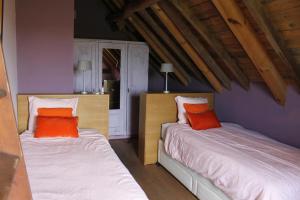 Een bed of bedden in een kamer bij La Jauchelle