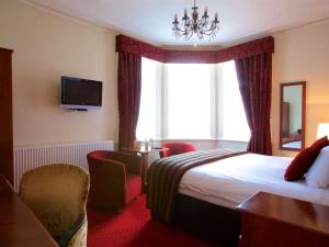 A bed or beds in a room at Chester Station Hotel, Sure Hotel Collection by Best Western 