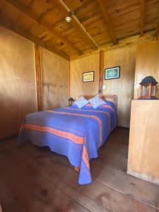 Кровать или кровати в номере Zirahuen Los Cedritos