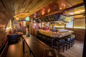 Posezení v ubytování Boutique Hotel Elburg met Tapperij