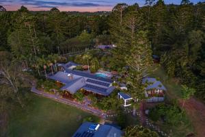 an overhead view of a house in the woods at Cape Byron Retreat (Adults-Only) in Byron Bay