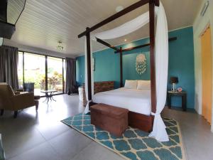 Voodi või voodid majutusasutuse Yellow Tree Suites toas