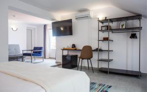 Postel nebo postele na pokoji v ubytování Hotel Mistral