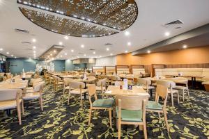 A restaurant or other place to eat at Nightcap at Monash Hotel