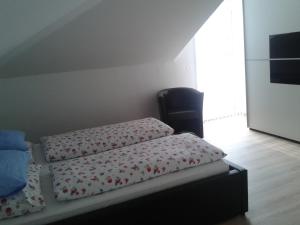 Postel nebo postele na pokoji v ubytování Haus Senel