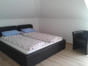 Postel nebo postele na pokoji v ubytování Haus Senel