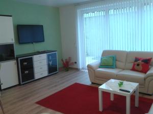 TV a/nebo společenská místnost v ubytování Haus Senel