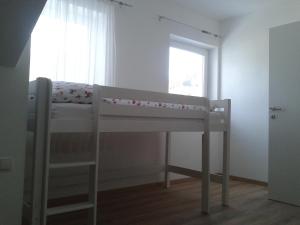 Postel nebo postele na pokoji v ubytování Haus Senel