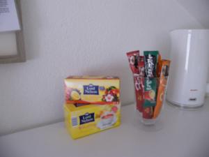 a counter with a box of cereal and a container of snacks at Apartment Mamut in Premantura