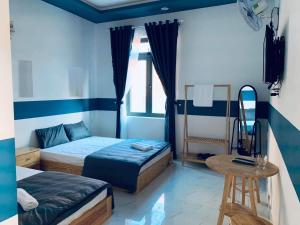 Postel nebo postele na pokoji v ubytování November Villa Đà Lạt