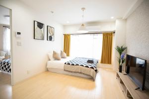 Katil atau katil-katil dalam bilik di 寅ホテル 台東 Hotel 寅 台东 Tora Hotel Taito C