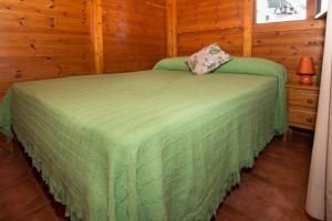 Postel nebo postele na pokoji v ubytování Complejo Turístico & Camping Cabopino
