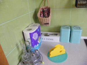 a bathroom counter with a roll of toilet paper at Apartment Mamut in Premantura