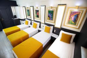 Postel nebo postele na pokoji v ubytování Exporoyal Hotel
