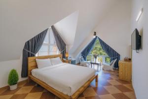 Postel nebo postele na pokoji v ubytování T&K Guesthouse
