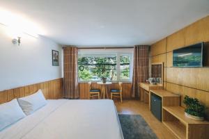 Postel nebo postele na pokoji v ubytování T&K Guesthouse + 37 fotografií