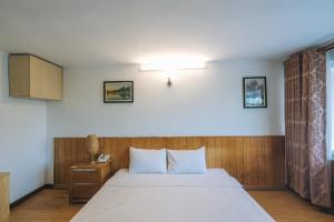 Postel nebo postele na pokoji v ubytování T&K Guesthouse