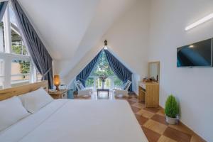 Postel nebo postele na pokoji v ubytování T&K Guesthouse