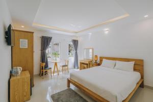 Postel nebo postele na pokoji v ubytování T&K Guesthouse