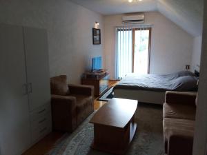 Ένα ή περισσότερα κρεβάτια σε δωμάτιο στο Holiday House Afan