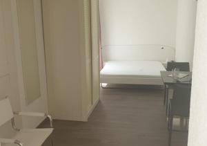 Katil atau katil-katil dalam bilik di Hotel Le Rivage