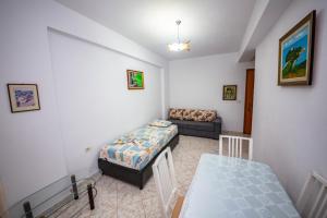 Postel nebo postele na pokoji v ubytování Apartments Cikuli