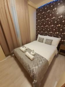 Postel nebo postele na pokoji v ubytování Apartmani CENTAR- Smederevo