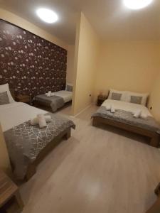 Postel nebo postele na pokoji v ubytování Apartmani CENTAR- Smederevo